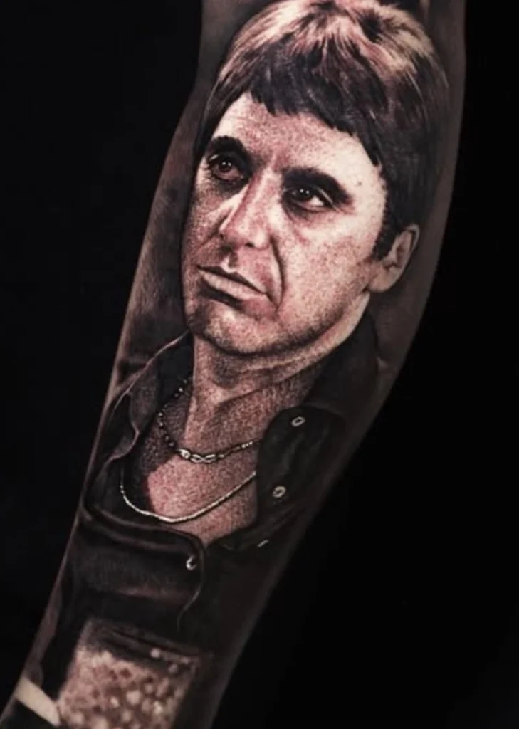 Black and grey portrait tattoo Melbourne artist creation of Al Pacino in Scarface showing exceptional detail and realism